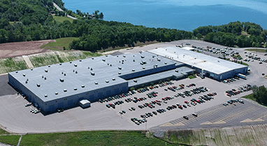 Aerial photo of HQ with lake in background